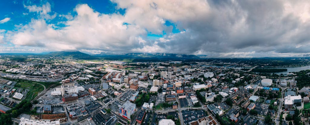 Panoramic aerial view capturing Chattanooga's vibrant skyline and surroundings.