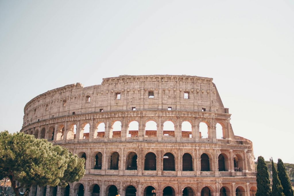 Stunning view of the Colosseum in Rome, showcasing its ancient architecture and historical significance.