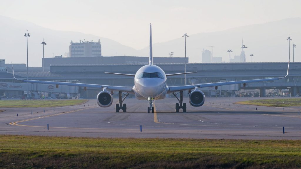 Airplane on the runway at an airport